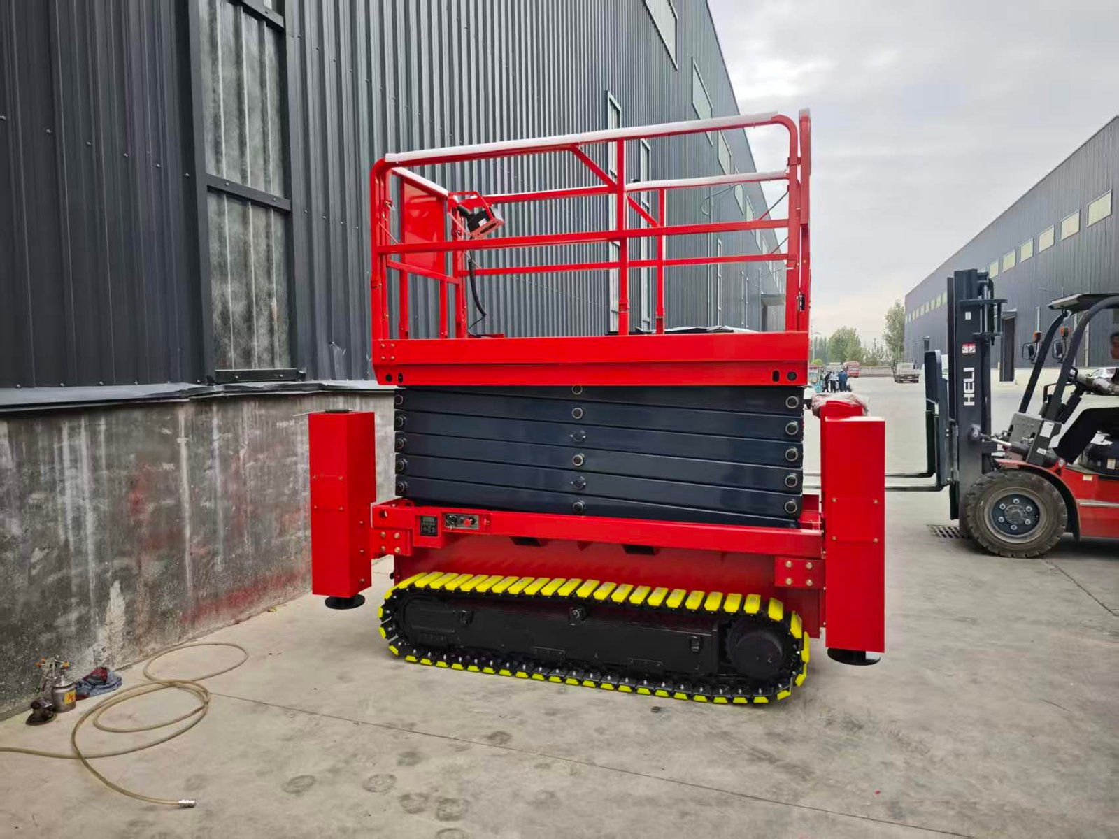 What is a rough terrain scissor lift?